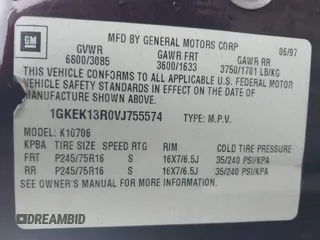 1997 GMC Yukon with VIN 1GKEK13R0VJ755574, listed as a IAAI auction lot 41158932 with 212,668 mi miles. Bid and sale history available at carsss.com. Image 9.