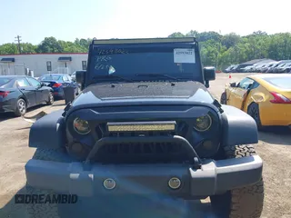 2015 Jeep Wrangler Unlimited Sport with VIN 1C4BJWDG2FL518487, listed as a IAAI auction lot 42593022 with 161,991 mi miles and . Bid and sale history available at DreamBid. Image 12.
