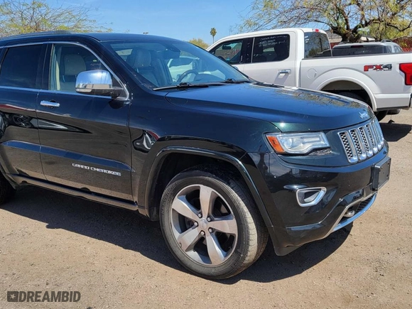 2014 Jeep Grand Cherokee Overland with VIN 1C4RJFCT7EC187319, listed as a Copart auction lot 52506115 with 98,314 mi miles and Clean Title. Bid and sale history available at carsss.com. Image 1.