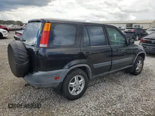 1997 Honda CR-V with VIN JHLRD185XVC069529, listed as a Copart auction lot 73660154 with 250,671 mi miles and Salvage Title. Bid and sale history available at carsss.com. Image 3.