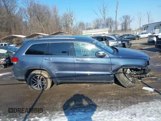2021 Jeep Grand Cherokee 80th Anniversary with VIN 1C4RJFBG2MC666167, listed as a IAAI auction lot 41392185 with 79,518 mi miles and . Bid and sale history available at DreamBid. Image 13.