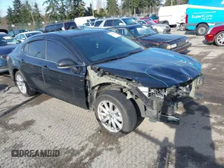 2020 Toyota Camry SE z VIN 4T1G11AK4LU920661, wystawiony jako IAAI lot #41523514 z przebiegiem 63 029 mil mil oraz . Historia ofert i sprzedaży dostępna na DreamBid. Obrazek 1.