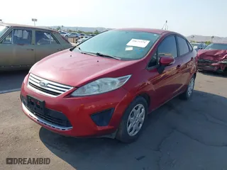 2013 Ford Fiesta SE with VIN 3FADP4BJ8DM194652, listed as a IAAI auction lot 39677371 with 74,261 mi miles. Bid and sale history available at carsss.com. Image 2.