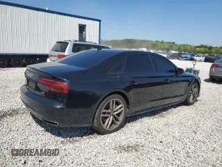 2017 Audi A8 with VIN WAU44AFD0HN006074, listed as a Copart auction lot 52421465 with 144,744 mi miles and Salvage title. Bid and sale history available at DreamBid. Image 3.