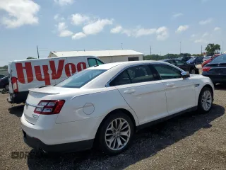2014 Ford Taurus Limited with VIN 1FAHP2F84EG121559, listed as a Copart auction lot 61764825 with 82,548 mi miles and Salvage title. Bid and sale history available at DreamBid. Image 3.