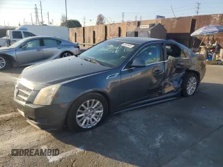 2010 Cadillac CTS with VIN 1G6DA5EG0A0133864, listed as a Copart auction lot 42970405 with 123,946 mi miles and Salvage Title. Bid and sale history available at DreamBid. Image 1.
