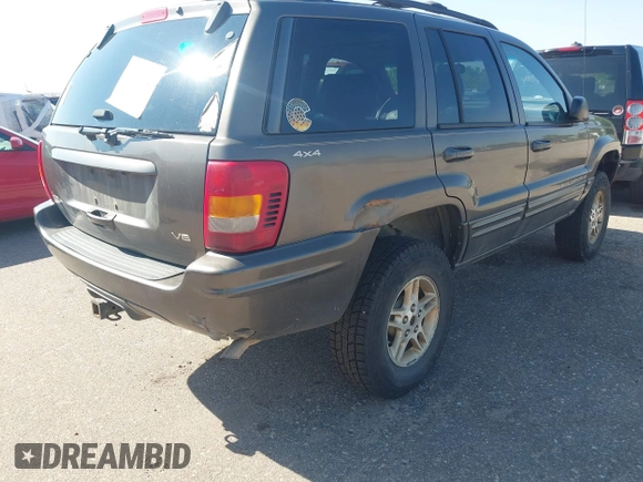 1999 Jeep Grand Cherokee Limited with VIN 1J4GW68N7XC617687, listed as a IAAI auction lot 42433705 with 186,312 mi miles and . Bid and sale history available at DreamBid. Image 6.