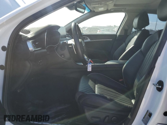 2020 Genesis G70 2.0T with VIN KMTG34LA0LU059887, listed as a Copart auction lot 76616894 with 32,658 mi miles and Salvage title. Bid and sale history available at DreamBid. Image 7.