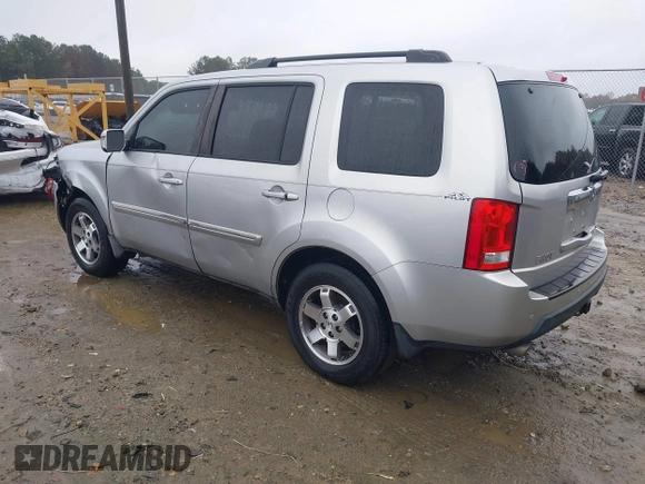 2010 Honda Pilot Touring with VIN 5FNYF3H89AB005861, listed as a IAAI auction lot 40828747 with 275,757 mi miles and . Bid and sale history available at DreamBid. Image 3.