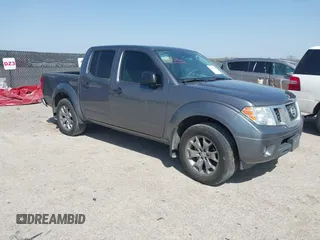 2021 Nissan Frontier SV z VIN 1N6ED0EA9MN707972, wystawiony jako IAAI lot #41823460 z przebiegiem 71 085 mil mil oraz . Historia ofert i sprzedaży dostępna na DreamBid. Obrazek 1.