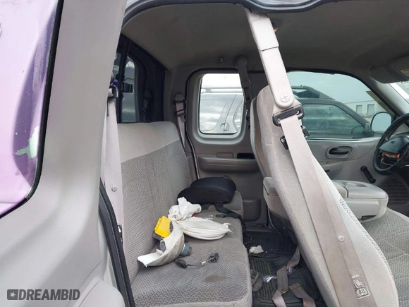 1999 Ford F-150 Work Series with VIN 1FTZX1720XKA10512, listed as a IAAI auction lot 41247083 with 169,154 mi miles. Bid and sale history available at carsss.com. Image 8.