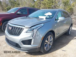 2025 Cadillac XT5 FWD Premium Luxury with VIN 1GYKNCRS1SZ120351, listed as a IAAI auction lot 41334881 with 4,915 mi miles. Bid and sale history available at carsss.com. Image 2.