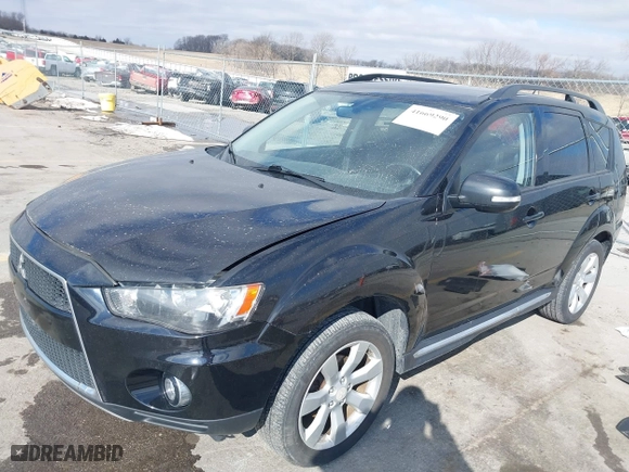 2010 Mitsubishi Outlander XLS with VIN JA4JT4AX6AZ002549, listed as a IAAI auction lot 41669290 with 136,757 mi miles. Bid and sale history available at carsss.com. Image 2.