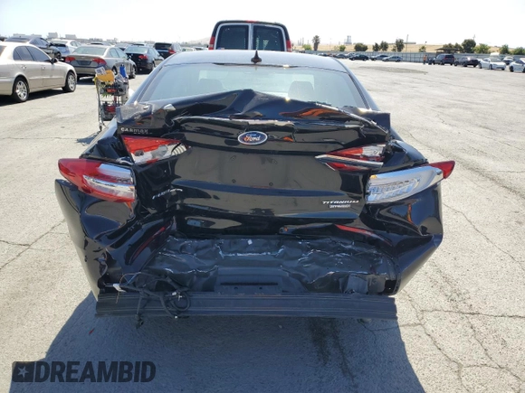 2020 Ford Fusion Titanium z VIN 3FA6P0RU3LR231920, wystawiony jako Copart lot #61643035 z przebiegiem 55 855 mil mil oraz Szkoda całkowita • Salvage title. Historia ofert i sprzedaży dostępna na DreamBid. Obrazek 6.