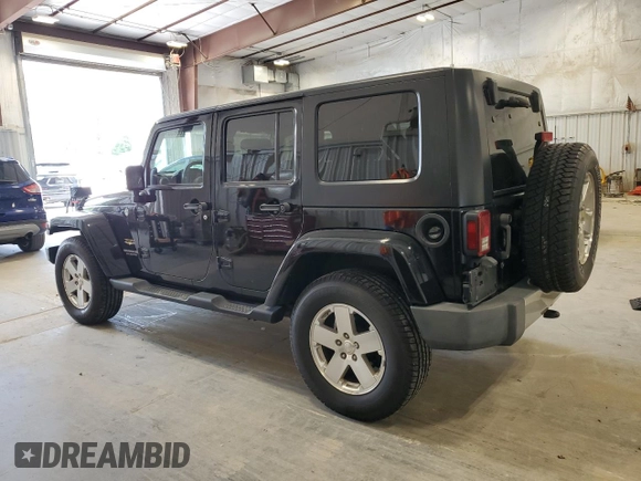 2008 Jeep Wrangler Unlimited Sahara with VIN 1J4GA59108L637009, listed as a Copart auction lot 63333705 with 181,778 mi miles and Clean title. Bid and sale history available at DreamBid. Image 2.
