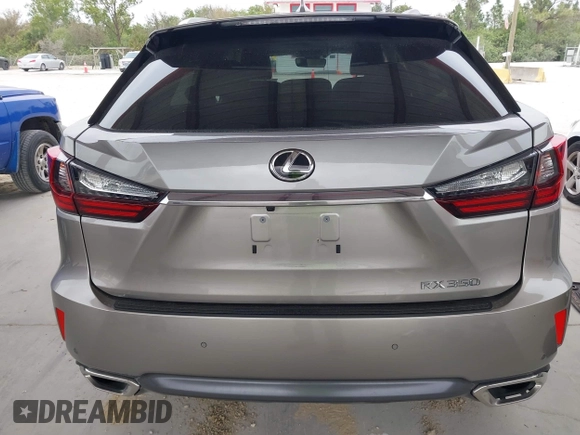 2018 Lexus RX 350 z VIN 2T2BZMCA3JC151296, wystawiony jako IAAI lot #41331203 z przebiegiem 73 051 mil mil oraz . Historia ofert i sprzedaży dostępna na DreamBid. Obrazek 16.