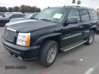 2005 Cadillac Escalade z VIN 1GYEC63T95R181022, wystawiony jako IAAI lot #41777173 z przebiegiem 44 348 mil mil oraz . Historia ofert i sprzedaży dostępna na DreamBid. Obrazek 16.