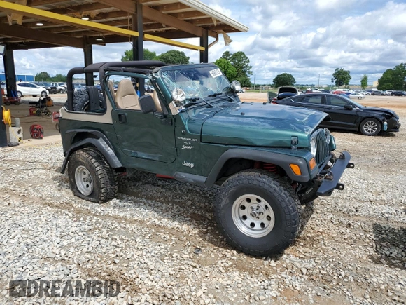 1999 Jeep Wrangler Sport with VIN 1J4FY19S0XP402688, listed as a Copart auction lot 58968125 with 211,910 mi miles and Salvage title. Bid and sale history available at DreamBid. Image 4.