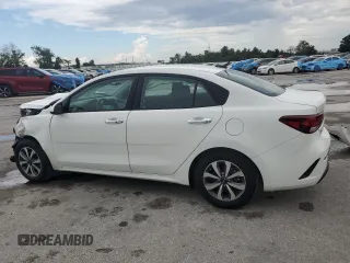 2023 Kia Rio S with VIN 3KPA24AD3PE573452, listed as a Copart auction lot 68249544 with 12,001 mi miles and Non Repairable. Bid and sale history available at DreamBid. Image 2.