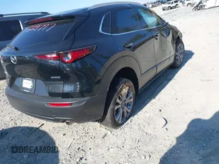 2023 Mazda CX-30 2.5 S Premium Package with VIN 3MVDMBDMXPM529797, listed as a IAAI auction lot 41012225 with 26,354 mi miles. Bid and sale history available at carsss.com. Image 4.