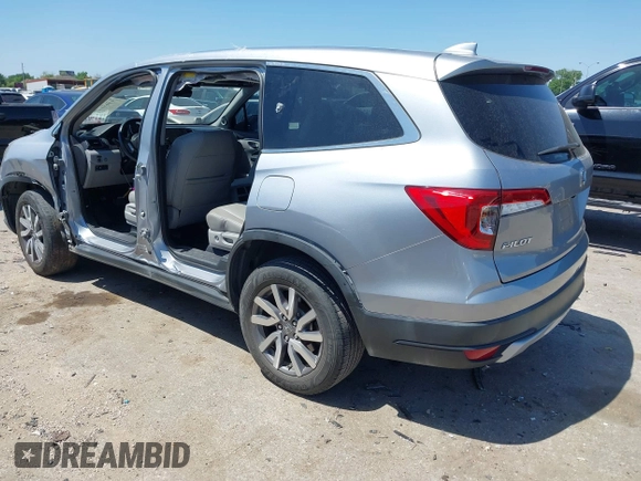 2019 Honda Pilot EX-L with VIN 5FNYF5H58KB040331, listed as a IAAI auction lot 41977727 with 90,655 mi miles and . Bid and sale history available at DreamBid. Image 3.
