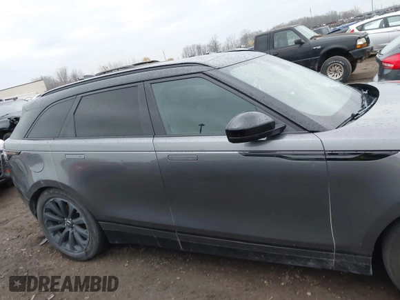 2018 Land Rover Range Rover Velar S z VIN SALYB2RV6JA750501, wystawiony jako IAAI lot #40882723 z przebiegiem 77 338 mil mil oraz . Historia ofert i sprzedaży dostępna na DreamBid. Obrazek 13.