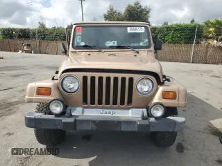 1999 Jeep Wrangler Sahara with VIN 1J4FY49S3XP441051, listed as a Copart auction lot 50946175 with 112,884 mi miles and Salvage Title. Bid and sale history available at carsss.com. Image 5.