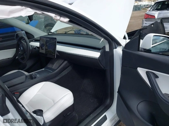 2021 Tesla Model Y Long Range with VIN 5YJYGDEEXMF283914, listed as a IAAI auction lot 41661936 with 53,212 mi miles. Bid and sale history available at carsss.com. Image 5.