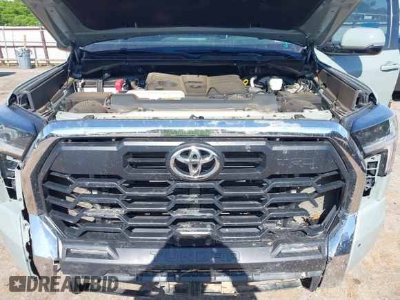 2022 Toyota Tundra SR5 with VIN 5TFLA5AB7NX013477, listed as a IAAI auction lot 42172272 with 30,460 mi miles and . Bid and sale history available at DreamBid. Image 10.