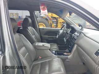2007 Honda Pilot EX-L with VIN 2HKYF18557H507206, listed as a IAAI auction lot 42195899 with 284,784 mi miles. Bid and sale history available at carsss.com. Image 5.
