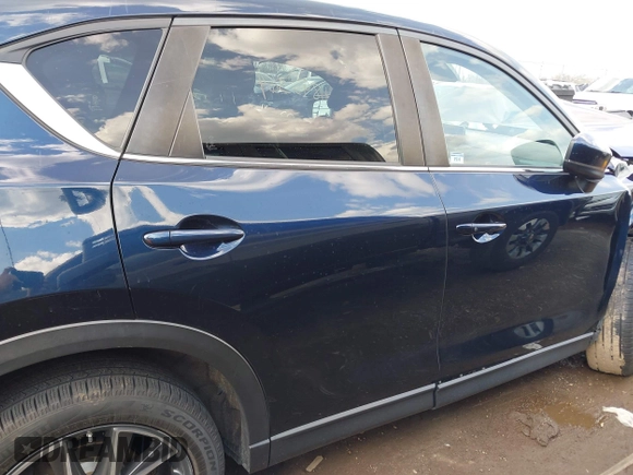 2018 Mazda CX-5 Touring with VIN JM3KFBCM5J0369799, listed as a IAAI auction lot 41895364 with 76,801 mi miles and . Bid and sale history available at carsss.com. Image 13.