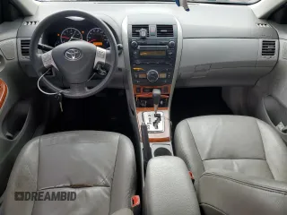 2010 Toyota Corolla with VIN 1NXBU4EE0AZ211178, listed as a Copart auction lot 59043055 with 182,374 mi miles and Salvage title. Bid and sale history available at DreamBid. Image 8.