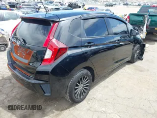 2017 Honda Fit LX with VIN JHMGK5H51HS012176, listed as a IAAI auction lot 42011477 with 91,894 mi miles. Bid and sale history available at carsss.com. Image 4.
