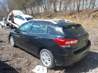 2017 Subaru Impreza Premium with VIN 4S3GTAD65H3716428, listed as a IAAI auction lot 41942299 with 77,181 mi miles. Bid and sale history available at carsss.com. Image 3.