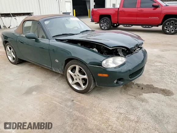 2001 Mazda MX-5 Miata z VIN JM1NB353810212392, wystawiony jako Copart lot #44398295 z przebiegiem 88 601 mil mil oraz Szkoda całkowita • Salvage title. Historia ofert i sprzedaży dostępna na DreamBid. Obrazek 10.