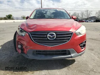 2016 Mazda CX-5 Touring with VIN JM3KE2CY9G0807478, listed as a Copart auction lot 47393775 with 105,034 mi miles and Salvage Title. Bid and sale history available at carsss.com. Image 5.