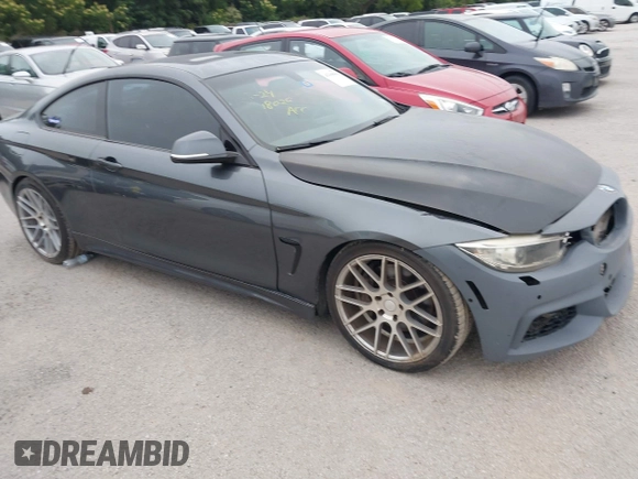 2014 BMW 4 Series 435i xDrive with VIN WBA3R5C53EK188805, listed as a IAAI auction lot 42365884 with 148,294 mi miles and . Bid and sale history available at DreamBid. Image 1.