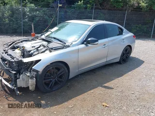 2015 Infiniti Q50 with VIN JN1BV7AP6FM354690, listed as a IAAI auction lot 42410614 with 98,527 mi miles and . Bid and sale history available at DreamBid. Image 2.
