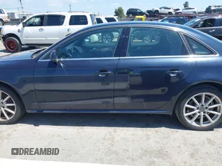 2016 Audi A4 Premium with VIN WAUAFAFL8GN007735, listed as a IAAI auction lot 42090145 with 200,616 mi miles. Bid and sale history available at carsss.com. Image 14.