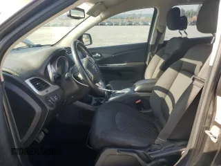 2014 Dodge Journey American Value with VIN 3C4PDCABXET277897, listed as a Copart auction lot 60566735 with 113,343 mi miles and Salvage title. Bid and sale history available at DreamBid. Image 7.