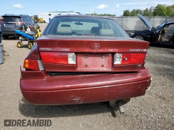 2001 Toyota Camry LE z VIN JT2BF22K610295178, wystawiony jako Copart lot #68538524 z przebiegiem 507 822 mil mil oraz Szkoda całkowita • Salvage title. Historia ofert i sprzedaży dostępna na DreamBid. Obrazek 6.