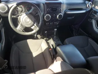 2017 Jeep Wrangler Unlimited Sahara with VIN 1C4BJWEG8HL657654, listed as a Copart auction lot 51763015 with 87,949 mi miles and Salvage Title. Bid and sale history available at carsss.com. Image 8.
