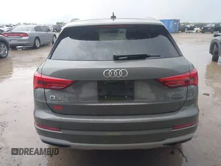 2020 Audi Q3 Premium z VIN WA1AECF30L1052472, wystawiony jako IAAI lot #41886809 z przebiegiem 101 600 mil mil oraz . Historia ofert i sprzedaży dostępna na DreamBid. Obrazek 16.