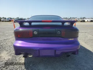 1998 Pontiac Firebird Formula z VIN 2G2FV22G3W2223937, wystawiony jako Copart lot #59905135 z przebiegiem 87 658 mil mil oraz Czysty tytuł • Clean title. Historia ofert i sprzedaży dostępna na DreamBid. Obrazek 6.