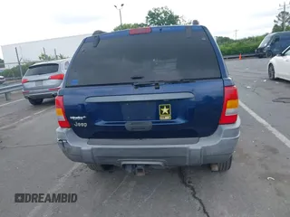 2002 Jeep Grand Cherokee Laredo with VIN 1J4GX48S02C125258, listed as a IAAI auction lot 42388724 with 295,270 mi miles and . Bid and sale history available at DreamBid. Image 16.