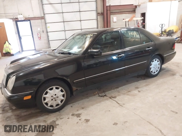 1998 Mercedes-Benz E-Class with VIN WDBJF65F7WA617755, listed as a IAAI auction lot 41737424 with 113,068 mi miles. Bid and sale history available at carsss.com. Image 2.