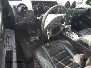 2005 Hummer H2 SUT with VIN 5GRGN22U85H110412, listed as a Copart auction lot 73856704 with 262,954 mi miles and Salvage Title. Bid and sale history available at carsss.com. Image 8.