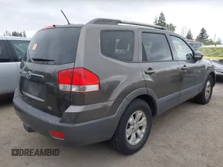 2009 Kia Borrego EX with VIN KNDJH741995015542, listed as a IAAI auction lot 42120069 with 139,457 mi miles. Bid and sale history available at carsss.com. Image 4.