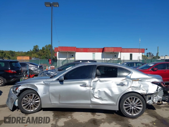 2020 Infiniti Q50 Luxe with VIN JN1EV7AR6LM256477, listed as a IAAI auction lot 40631166 with 89,908 mi miles and . Bid and sale history available at DreamBid. Image 14.