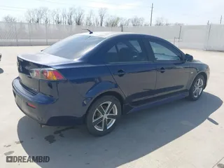 2013 Mitsubishi Lancer SE with VIN JA32V2FW4DU002980, listed as a IAAI auction lot 41803574 with 195,940 mi miles. Bid and sale history available at carsss.com. Image 4.